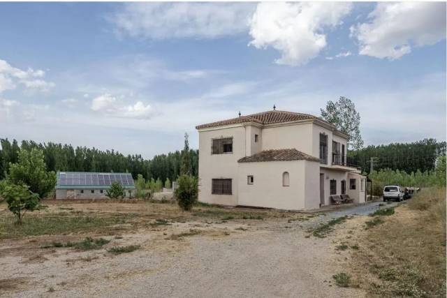 Land with House and Stables in Spain