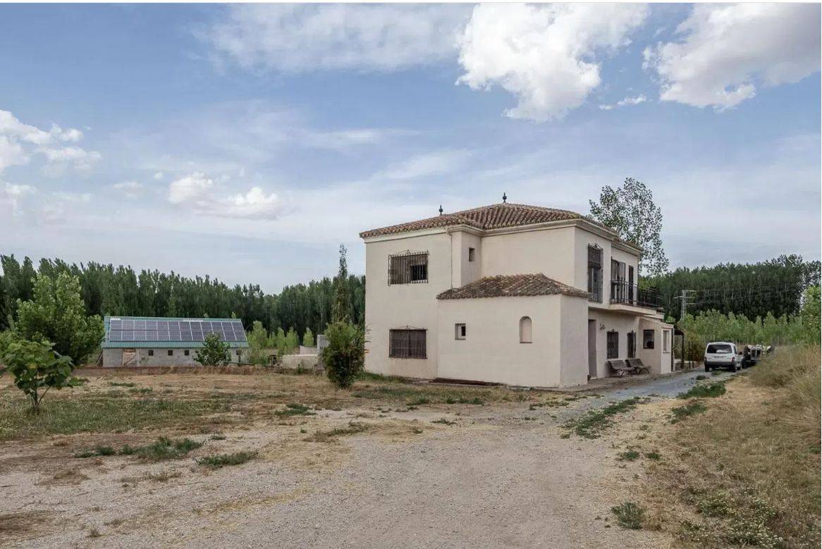 Land with House and Stables in Spain